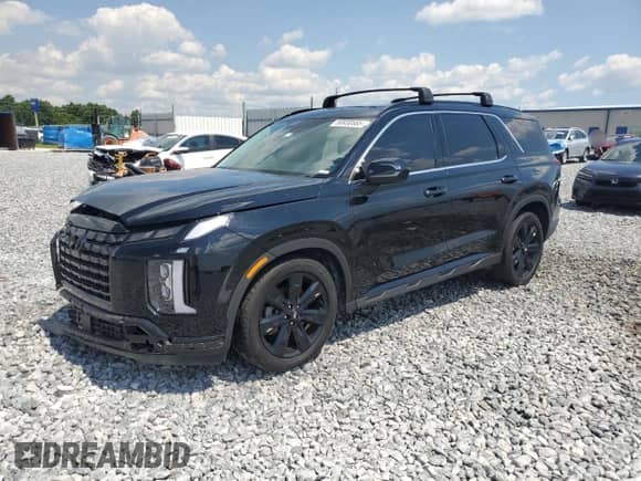 2023 Hyundai Palisade XRT с VIN KM8R34GE7PU490054, выставлен на аукционе Copart как лот 56938585 с пробегом 91 596 миль миль и На запчасти • Non repairable. История ставок и продаж доступна на DreamBid. Изображение 1.
