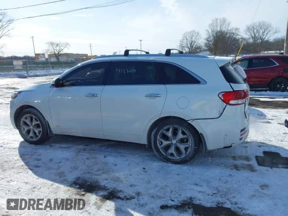 2016 Kia Sorento SXL z VIN 5XYPKDA51GG108352, wystawiony jako IAAI lot #41591684 z przebiegiem 175 872 mil mil oraz . Historia ofert i sprzedaży dostępna na DreamBid. Obrazek 15.