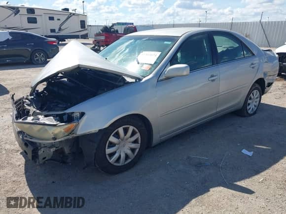 2005 Toyota Camry LE with VIN 4T1BE30K85U015936, listed as a IAAI auction lot 43383074 with 163,145 mi miles and . Bid and sale history available at DreamBid. Image 2.