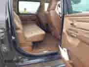 2019 Ram 1500 Longhorn with VIN 1C6SRFKT7KN518337, listed as a IAAI auction lot 41502569 with 76,226 mi miles and . Bid and sale history available at DreamBid. Image 8.