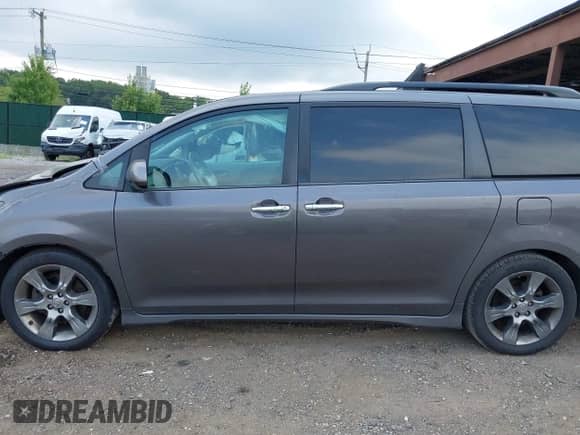 2014 Toyota Sienna SE with VIN 5TDXK3DC8ES440762, listed as a IAAI auction lot 42852260 with 191,156 mi miles and . Bid and sale history available at DreamBid. Image 15.