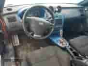 2003 Hyundai Tiburon GT с VIN KMHHN65F03U066786, выставлен на аукционе Copart как лот 84249025 с пробегом 178 084 миль миль и Чистый • Clean title. История ставок и продаж доступна на DreamBid. Изображение 8.