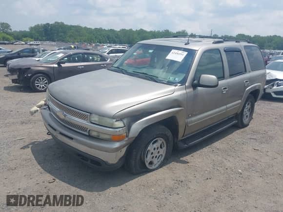 2002 Chevrolet Tahoe Z71 z VIN 1GNEK13Z32R322993, wystawiony jako IAAI lot #42456551 z przebiegiem 251 640 mil mil oraz . Historia ofert i sprzedaży dostępna na DreamBid. Obrazek 2.