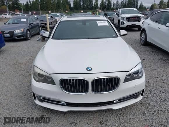 2013 BMW 7 Series 740Li with VIN WBAYE4C57DD136902, listed as a IAAI auction lot 43210485 with 70,724 mi miles and . Bid and sale history available at DreamBid. Image 12.