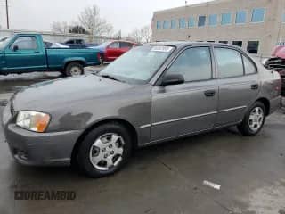 2002 Hyundai Accent GL с VIN KMHCG45C72U269610, выставлен на аукционе Copart как лот 80362953 с пробегом 89 481 миль миль и Списание • Salvage title. История ставок и продаж доступна на DreamBid. Изображение 1.