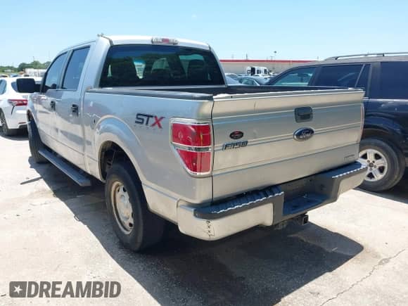 2014 Ford F-150 XL with VIN 1FTEW1CM2EFC42382, listed as a IAAI auction lot 42526873 with 162,868 mi miles and . Bid and sale history available at DreamBid. Image 3.