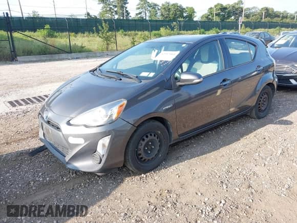 2015 Toyota Prius One z VIN JTDKDTB39F1096378, wystawiony jako IAAI lot #42947064 z przebiegiem 174 105 mil mil oraz . Historia ofert i sprzedaży dostępna na DreamBid. Obrazek 2.