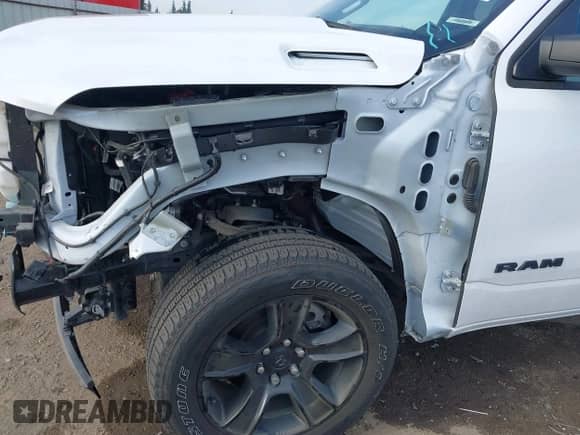 2023 Ram 1500 Lone Star z VIN 1C6RREBT8PN553095, wystawiony jako IAAI lot #41647688 z przebiegiem 18 574 mil mil oraz . Historia ofert i sprzedaży dostępna na DreamBid. Obrazek 18.