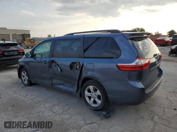 2015 Toyota Sienna LE AAS with VIN 5TDKK3DC7FS591670, listed as a Copart auction lot 68836635 with 118,873 mi miles and Salvage title. Bid and sale history available at DreamBid. Image 2.