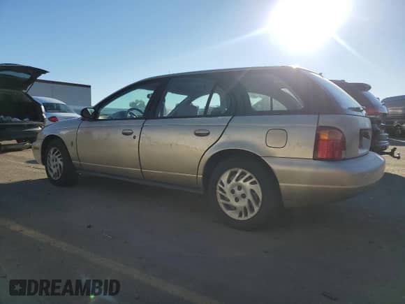 1999 Saturn SW with VIN 1G8ZK8271XZ368987, listed as a Copart auction lot 82610964 with 222,100 mi miles and Clean title. Bid and sale history available at DreamBid. Image 2.