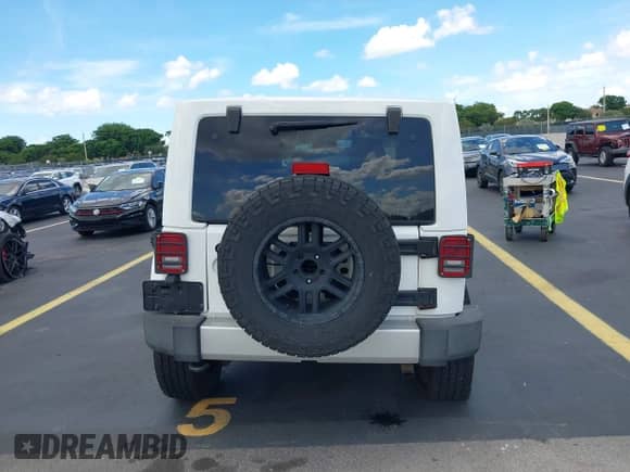 2012 Jeep Wrangler Arctic with VIN 1C4AJWBG2CL229653, listed as a IAAI auction lot 42469581 with 85,293 mi miles and . Bid and sale history available at DreamBid. Image 16.