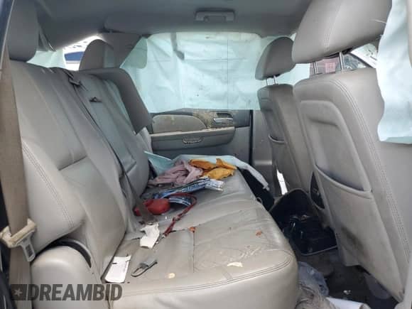 2012 Chevrolet Suburban LT с VIN 1GNSCJE00CR130379, выставлен на аукционе Copart как лот 64384725 с пробегом 249 562 миль миль и На запчасти • Non repairable. История ставок и продаж доступна на DreamBid. Изображение 11.