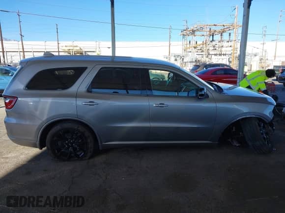 2020 Dodge Durango GT with VIN 1C4RDJDG7LC131857, listed as a IAAI auction lot 41265317 with 72,549 mi miles and . Bid and sale history available at DreamBid. Image 14.