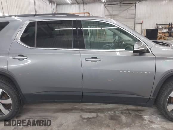 2020 Chevrolet Traverse LT with VIN 1GNEVHKW4LJ256719, listed as a IAAI auction lot 42629566 with 110,357 mi miles and . Bid and sale history available at DreamBid. Image 13.