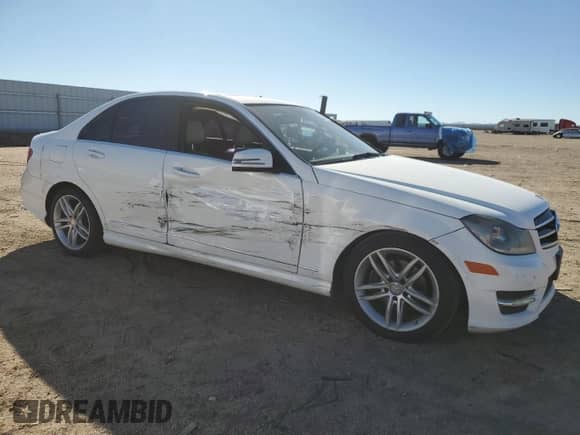 2014 Mercedes-Benz C 250 Sport with VIN WDDGF4HB6EA952812, listed as a Copart auction lot 87303155 with 159,094 mi miles and Salvage title. Bid and sale history available at DreamBid. Image 4.