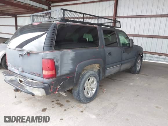 2002 Chevrolet Suburban LT z VIN 1GNFK16T92J132948, wystawiony jako IAAI lot #42439952 z przebiegiem 251 493 mil mil oraz . Historia ofert i sprzedaży dostępna na DreamBid. Obrazek 4.