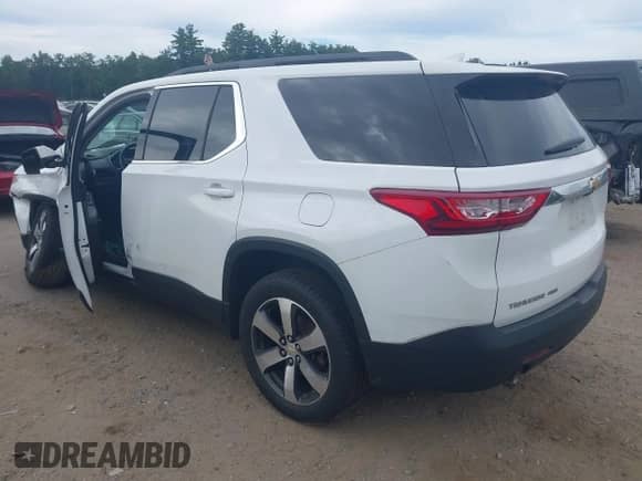 2021 Chevrolet Traverse LT z VIN 1GNEVHKW4MJ151423, wystawiony jako IAAI lot #42934838 z przebiegiem 127 483 mil mil oraz . Historia ofert i sprzedaży dostępna na DreamBid. Obrazek 3.