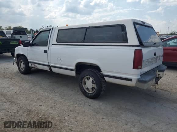 1997 Chevrolet Silverado 1500 with VIN 1GCEC14RXVZ124680, listed as a Copart auction lot 80872365 with 158,021 mi miles and Salvage title. Bid and sale history available at DreamBid. Image 2.