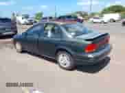 1999 Saturn SL z VIN 1G8ZK5274XZ351289, wystawiony jako IAAI lot #41734679 z przebiegiem 140 006 mil mil oraz . Historia ofert i sprzedaży dostępna na DreamBid. Obrazek 3.