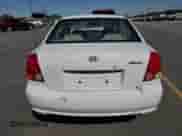 2003 Hyundai Accent GL z VIN KMHCG45C73U427901, wystawiony jako Copart lot #63874575 z przebiegiem 134 268 mil mil oraz Szkoda całkowita • Salvage title. Historia ofert i sprzedaży dostępna na DreamBid. Obrazek 6.