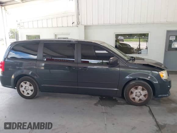 2011 Dodge Grand Caravan Express with VIN 2D4RN4DG8BR732069, listed as a IAAI auction lot 43136974 with 110,947 mi miles and . Bid and sale history available at DreamBid. Image 13.