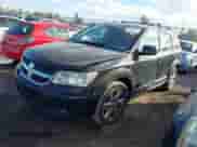 2009 Dodge Journey SXT with VIN 3D4GG57V09T150086, listed as a IAAI auction lot 43372257 with 210,256 mi miles and . Bid and sale history available at DreamBid. Image 2.