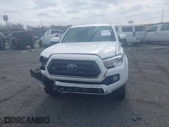 2022 Toyota Tacoma SR with VIN 3TYSX5EN9NT014347, listed as a IAAI auction lot 41631557 with 10 mi miles and . Bid and sale history available at DreamBid. Image 12.