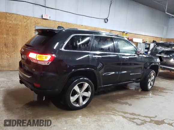 2015 Jeep Grand Cherokee Overland с VIN 1C4RJFCT1FC820933, выставлен на аукционе Copart как лот 66828805 с пробегом 72 577 миль миль и Чистый • Clean title. История ставок и продаж доступна на DreamBid. Изображение 3.