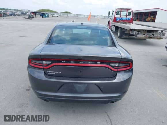 2020 Dodge Charger Police z VIN 2C3CDXKT6LH118253, wystawiony jako IAAI lot #42507562 z przebiegiem 128 786 mil mil oraz . Historia ofert i sprzedaży dostępna na DreamBid. Obrazek 16.