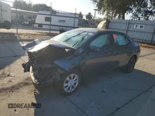 2016 Toyota Corolla L z VIN 5YFBURHE3GP568471, wystawiony jako Copart lot #80185575 z przebiegiem 112 698 mil mil oraz Szkoda całkowita • Salvage title. Historia ofert i sprzedaży dostępna na DreamBid. Obrazek 1.