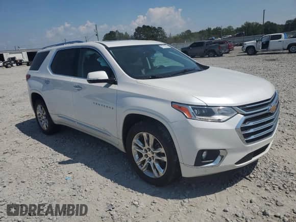 2018 Chevrolet Traverse High Country with VIN 1GNEVKKW9JJ118670, listed as a Copart auction lot 80742375 with 83,079 mi miles and Salvage title. Bid and sale history available at DreamBid. Image 4.