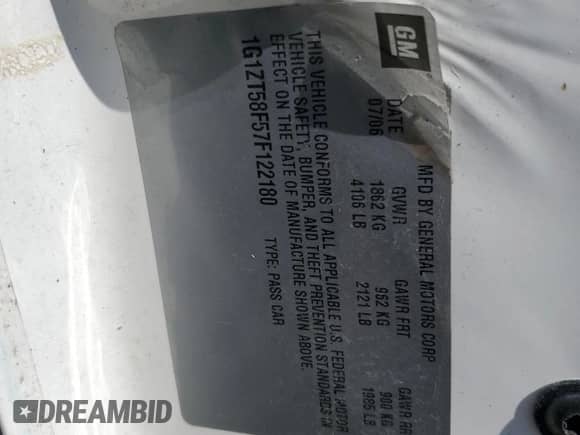 2007 Chevrolet Malibu 1LT z VIN 1G1ZT58F57F122180, wystawiony jako Copart lot #83824735 z przebiegiem 197 638 mil mil oraz Szkoda całkowita • Salvage title. Historia ofert i sprzedaży dostępna na DreamBid. Obrazek 12.