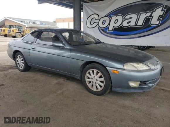 1992 Lexus SC 400 z VIN JT8UZ30C2N0002485, wystawiony jako Copart lot #89553365 z przebiegiem 260 100 mil mil oraz Czysty tytuł • Clean title. Historia ofert i sprzedaży dostępna na DreamBid. Obrazek 4.