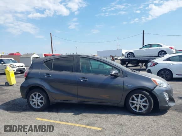 2015 Toyota Prius One z VIN JTDKDTB39F1092962, wystawiony jako IAAI lot #43125652 z przebiegiem 112 035 mil mil oraz . Historia ofert i sprzedaży dostępna na DreamBid. Obrazek 13.