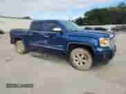 2015 GMC Sierra 1500 Denali with VIN 3GTU2WEC2FG242763, listed as a Copart auction lot 84776825 with 118,062 mi miles and Salvage title. Bid and sale history available at DreamBid. Image 4.
