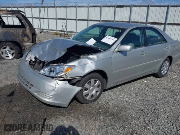 2004 Toyota Camry LE with VIN 4T1BE32KX4U918309, listed as a IAAI auction lot 43404751 with 365,218 mi miles and . Bid and sale history available at DreamBid. Image 2.