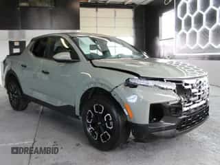 2022 Hyundai Santa Cruz SEL с VIN 5NTJBDAEXNH026424, выставлен на аукционе Copart как лот 84966165 с пробегом 50 074 миль миль и На запчасти • Non repairable. История ставок и продаж доступна на DreamBid. Изображение 1.