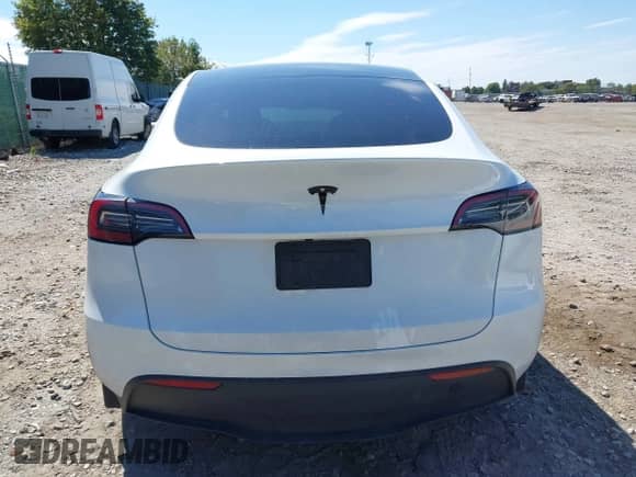 2023 Tesla Model Y Long Range with VIN 7SAYGDEE9PA033911, listed as a IAAI auction lot 43202182 with 35,938 mi miles and . Bid and sale history available at DreamBid. Image 16.