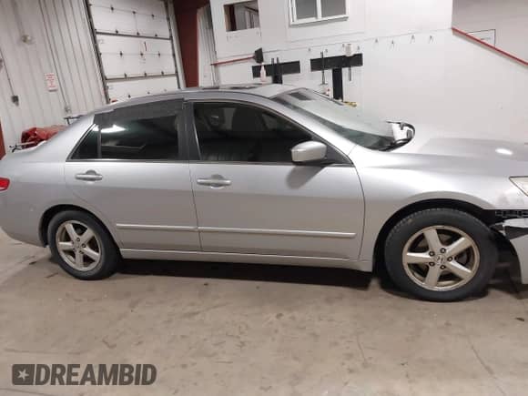 2003 Honda Accord EX z VIN JHMCM55623C053506, wystawiony jako IAAI lot #41572271 z przebiegiem 199 802 mil mil oraz . Historia ofert i sprzedaży dostępna na DreamBid. Obrazek 13.