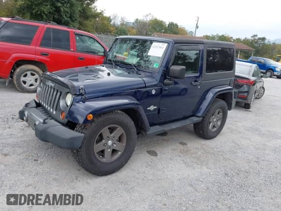 2013 Jeep Wrangler Sport with VIN 1C4AJWAG7DL565091, listed as a IAAI auction lot 43267062 with 192,629 mi miles and . Bid and sale history available at DreamBid. Image 2.