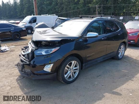 2018 Chevrolet Equinox Premier with VIN 2GNAXWEX3J6214800, listed as a IAAI auction lot 43071238 with 51,071 mi miles and . Bid and sale history available at DreamBid. Image 18.