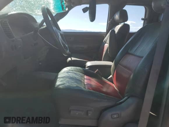 2001 Toyota Tundra Limited z VIN 5TBBT48181S165094, wystawiony jako Copart lot #55515765 z przebiegiem 264 859 mil mil oraz Czysty tytuł • Clean title. Historia ofert i sprzedaży dostępna na DreamBid. Obrazek 7.