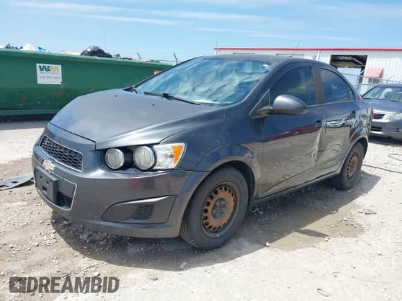 2016 Chevrolet Sonic LS z VIN 1G1JA5SH1G4132679, wystawiony jako IAAI lot #42321088 z przebiegiem 140 837 mil mil oraz . Historia ofert i sprzedaży dostępna na DreamBid. Obrazek 17.