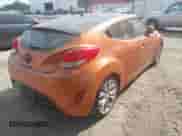 2012 Hyundai Veloster w/Gray Int z VIN KMHTC6AD5CU074516, wystawiony jako IAAI lot #42061623 z przebiegiem 133 338 mil mil oraz . Historia ofert i sprzedaży dostępna na DreamBid. Obrazek 4.