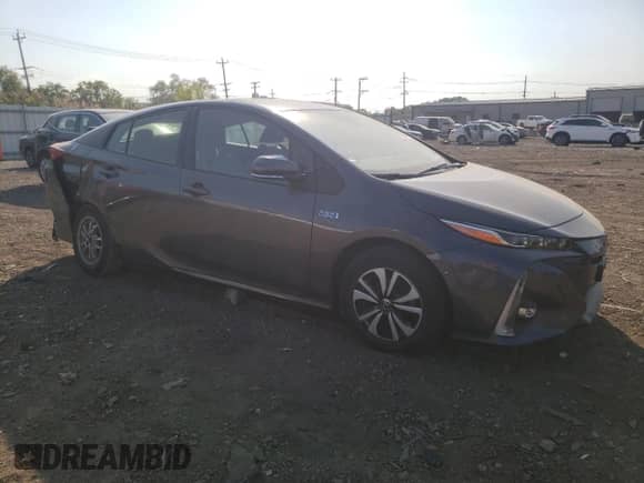 2018 Toyota Prius Plus with VIN JTDKARFP1J3100462, listed as a Copart auction lot 80514995 with 70,669 mi miles and Salvage title. Bid and sale history available at DreamBid. Image 4.