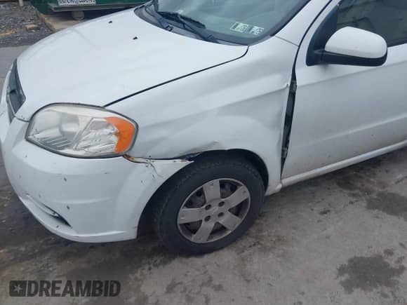 2011 Chevrolet Aveo 1LT z VIN KL1TD5DE4BB153144, wystawiony jako IAAI lot #43434825 z przebiegiem 192 074 mil mil oraz . Historia ofert i sprzedaży dostępna na DreamBid. Obrazek 6.