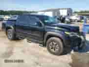 2023 Toyota Tacoma SR with VIN 3TYCZ5AN8PT160505, listed as a Copart auction lot 64601695 with 35,234 mi miles and Salvage title. Bid and sale history available at DreamBid. Image 4.