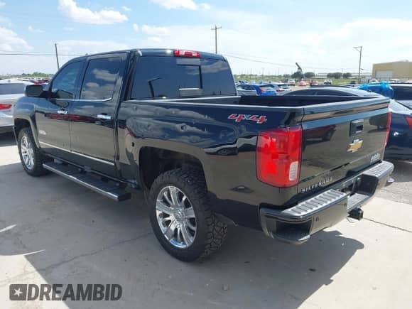 2016 Chevrolet Silverado 1500 High Country z VIN 3GCUKTEC0GG363629, wystawiony jako IAAI lot #42742870 z przebiegiem 82 715 mil mil oraz . Historia ofert i sprzedaży dostępna na DreamBid. Obrazek 3.