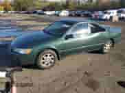 1999 Toyota Camry LE z VIN JT2BF28KXX0206776, wystawiony jako Copart lot #89648345 z przebiegiem 212 122 mil mil oraz Szkoda całkowita • Salvage title. Historia ofert i sprzedaży dostępna na DreamBid. Obrazek 1.