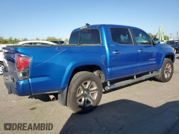 2016 Toyota Tacoma Limited с VIN 3TMGZ5AN9GM018015, выставлен на аукционе Copart как лот 82370585 с пробегом 185 654 миль миль и Списание • Salvage title. История ставок и продаж доступна на DreamBid. Изображение 3.